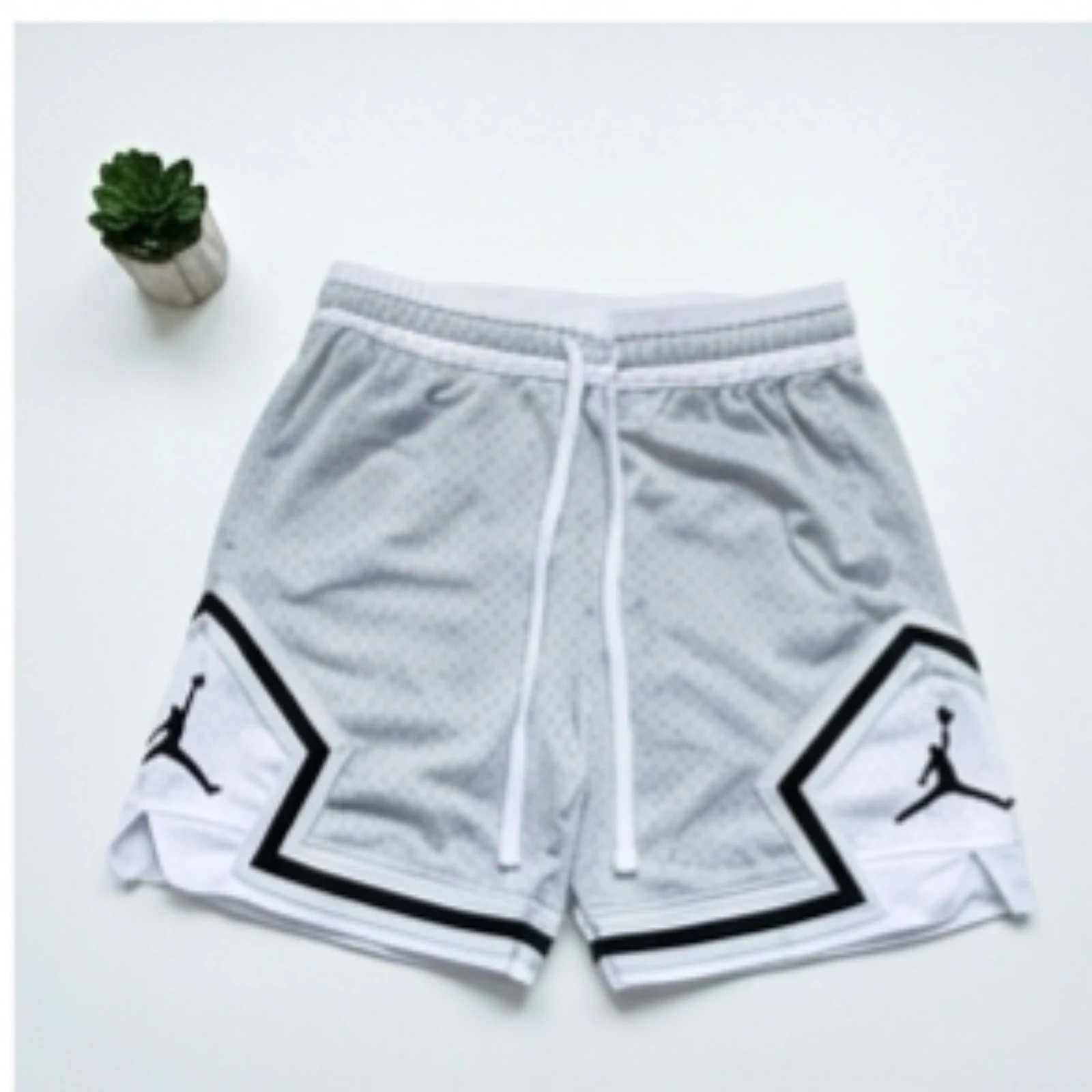 Pantalón corto Nike Jordan grises nuevos sin estrenar 100% poliéster originales